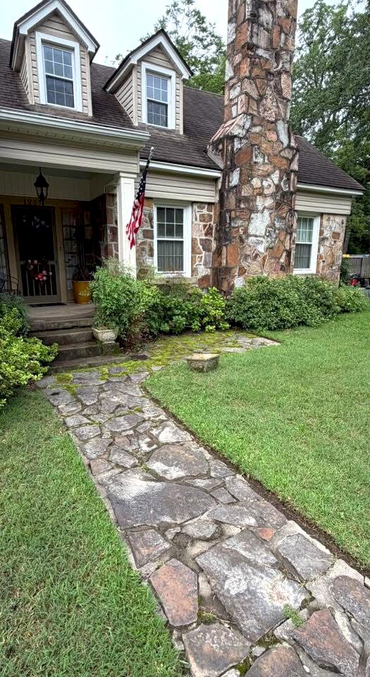 Stone pathway before Next Level's power wash